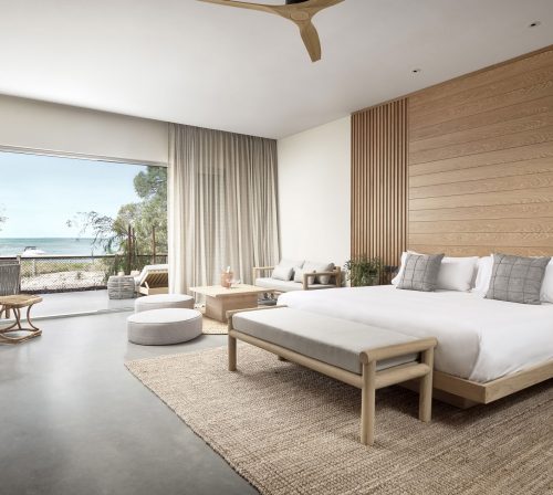 The Beachfront room with a private terrace and king size bed