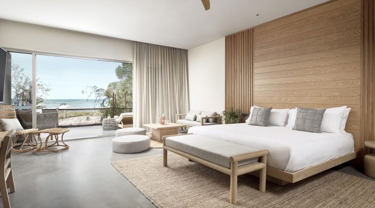 The Beachfront room with a private terrace and king size bed