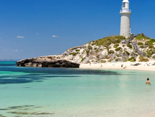 Image of Pinky Beach with lighthouse in the background